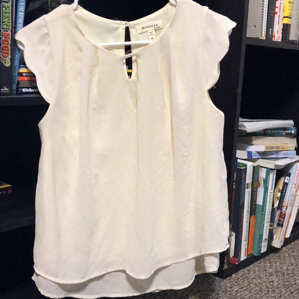 cream colored blouse